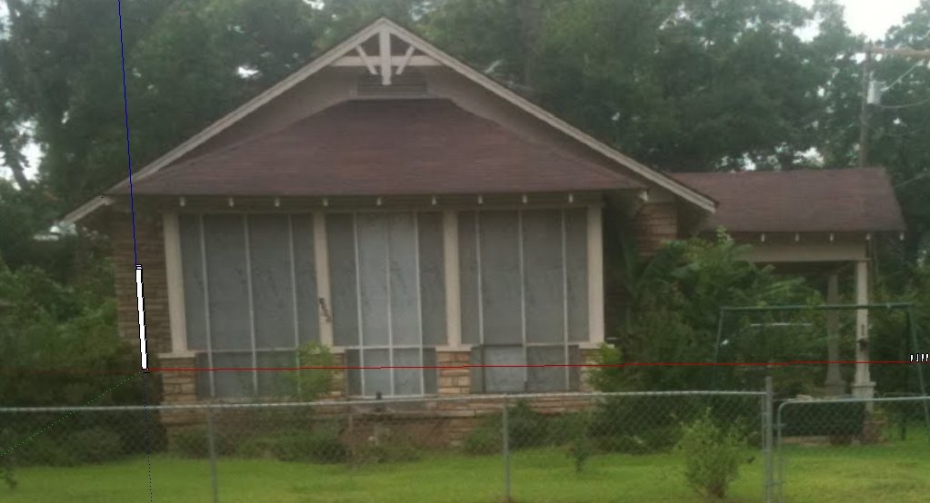 The original one-story house seen from College Drive