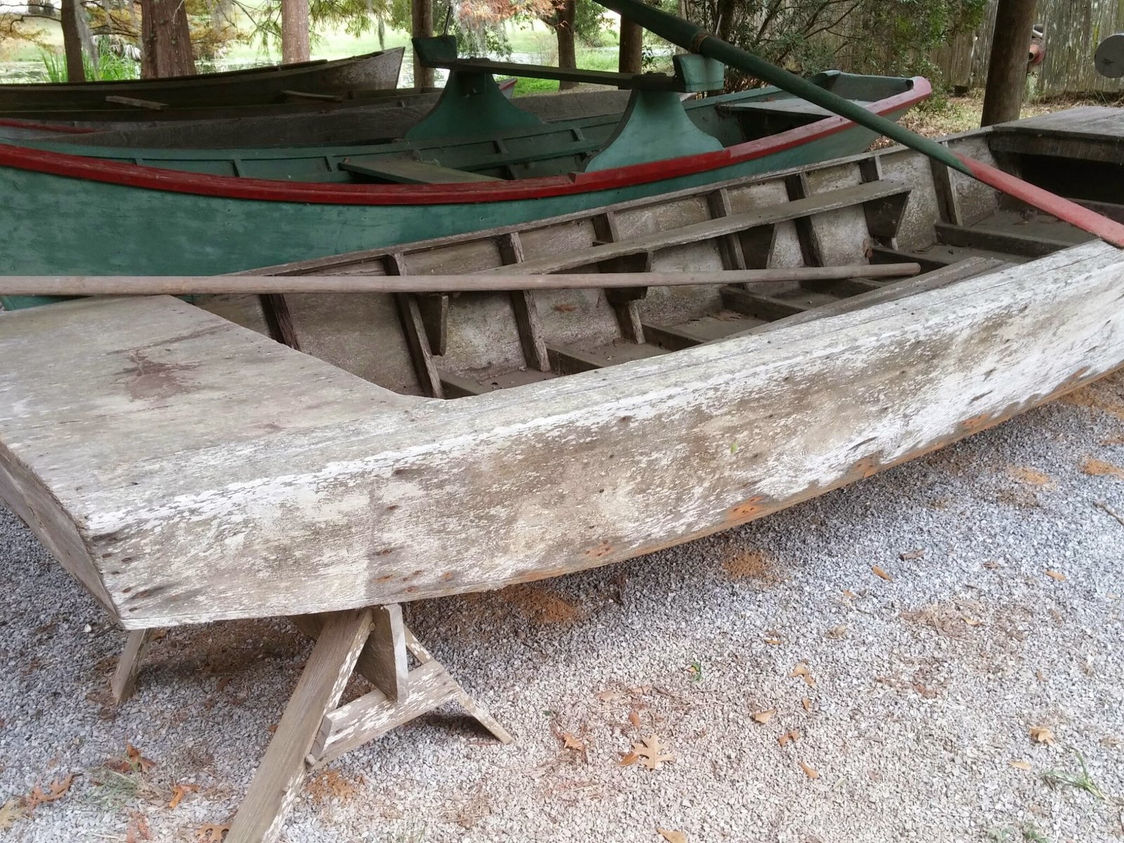 A pirogue, a narrow bayou boat hollowed from cypress