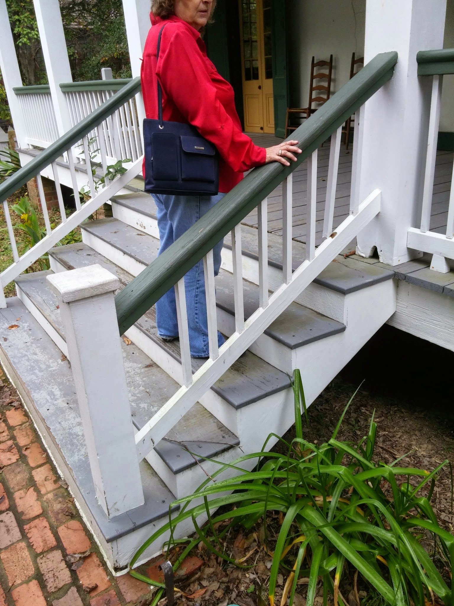 A staircase climbing a gallery wall